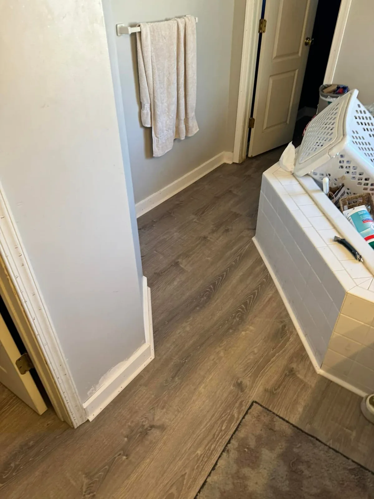 Luxury vinyl plank flooring installed by Beagle Services in a bathroom